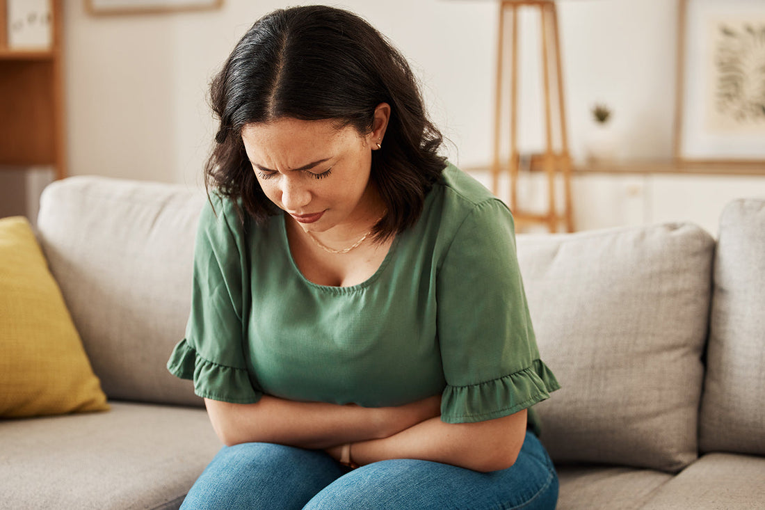 woman hanging over sitting on the couch
