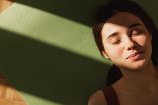 young woman laying in the sun